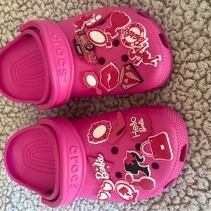 Crocs woman’s  Pink Clogs with Fun Graphics